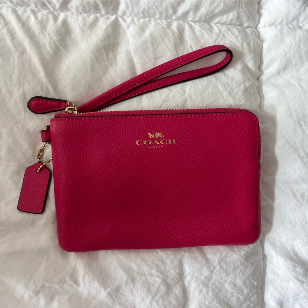 Hot pink coach wristlet